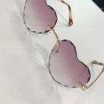 Gold-Tone Rimless Heart Scallop Sunglasses photo review