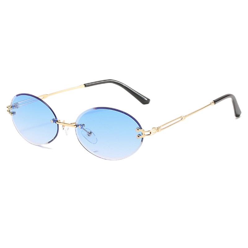 Womens Frameless Oval Sunglasses Gold-Tone Cutout Metal Arms Gradient Blue Lens